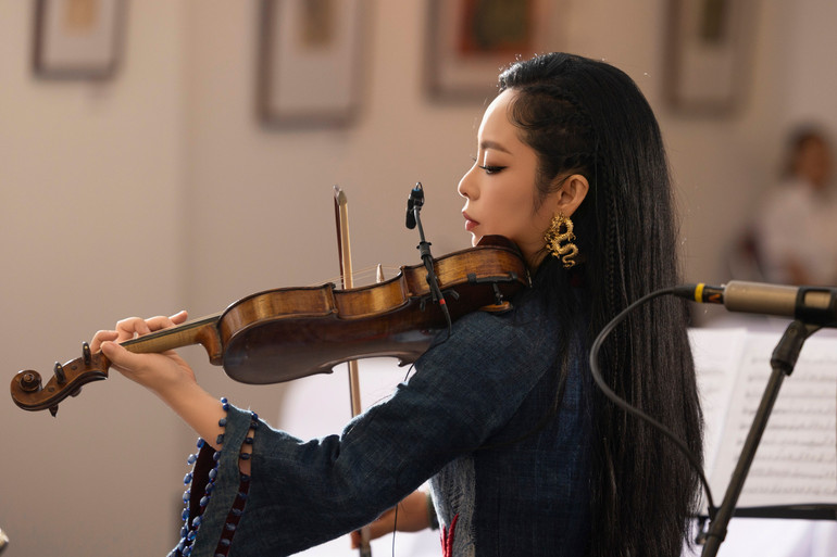 Musician Trinh Minh Hien devotes much effort to composing and arranging. dt024373.jpg