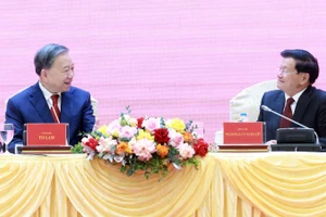 Tổng Bí thư Tô Lâm và Tổng Bí thư, Chủ tịch nước Lào Thongloun Sisoulith tại hội nghị. (Ảnh: TTXVN)