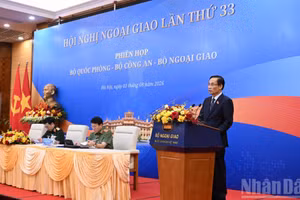 Ủy viên Bộ Chính trị, Bộ trưởng Ngoại giao Lê Hoài Trung phát biểu khai mạc phiên họp. (Ảnh: TRẦN HẢI)