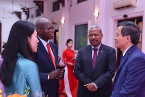 Đồng chí Đoàn Minh Huấn, Ủy viên Bộ Chính trị, Giám đốc Học viện Chính trị quốc gia Hồ Chí Minh tại buổi gặp mặt. 