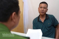 Đối tượng Lê Đức Hạnh tại cơ quan điều tra.