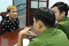 Nguyễn Anh Tuấn Vũ tại cơ quan điều tra. (Ảnh Công an cung cấp)