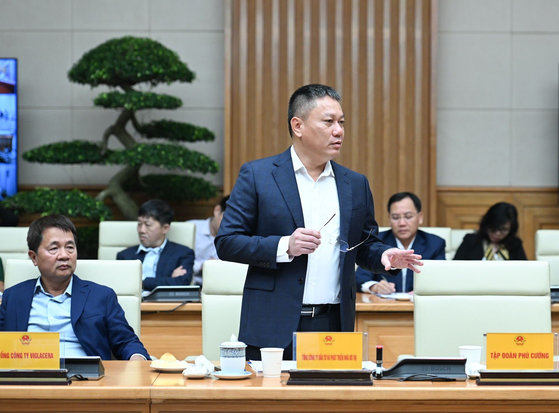 Đại diện lãnh đạo Tổng công ty Đầu tư và phát triển nhà đô thị phát biểu ý kiến tại hội nghị. dsc-0374.jpg