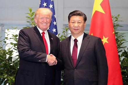 Chủ tịch Trung Quốc Tập Cận Bình và Tổng thống Mỹ Donald Trump gặp bên lề Hội nghị thượng đỉnh G20 tại Đức, năm 2017. (Ảnh: Tân Hoa Xã) 