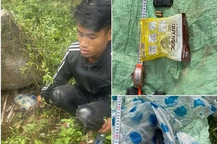 Một trong số 4 đối tượng bị bắt cùng hung khí là khẩu súng ngắn. (Ảnh: Công an Quảng Trị)