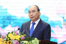 Chủ tịch nước Nguyễn Xuân Phúc phát biểu. (Ảnh: Thống Nhất/TTXVN)