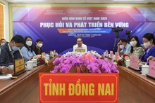 Đồng chí Quản Minh Cường chủ trì Diễn đàn kinh tế Việt Nam phục hồi và phát triển bền vững tại điểm cầu Đồng Nai.