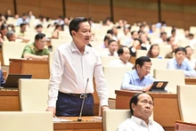 Phó Thủ tướng Lê Minh Khái phát biểu giải trình trước Quốc hội trong phiên làm việc tại hội trường ngày 2/6. (Ảnh: ĐĂNG KHOA)