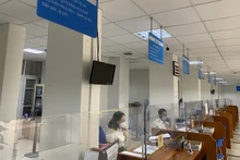 Hoạt động nghiệp vụ tại Cục Thuế Hà Nội. (Ảnh minh họa: TTXVN)