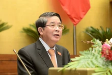 Chủ nhiệm Ủy ban Tài chính, Ngân sách của Quốc hội Nguyễn Đức Hải trình bày báo cáo thẩm tra tình hình thực hiện NSNN.