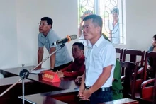 Bị cáo Nguyễn Trung Hải (áo trắng) tại phiên tòa.