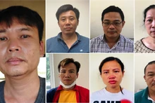 Các bị can (từ trái qua phải): Nguyễn Xuân Hanh; Đỗ Quang Tiến; Đỗ Khắc Tú Anh; Nguyễn Thị Ngọc Lâm; Nguyễn Tuấn Nghĩa; Kiều Thị Thúy; Hoàng Đình Văn.