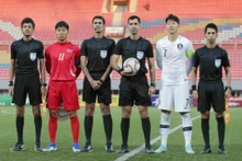 ĐT Triều Tiên (áo đỏ) rút lui khỏi vòng loại World Cup 2022. (Ảnh: AFC)