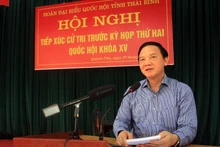 Phó Chủ tịch Quốc hội Nguyễn Khắc Định phát biểu tại buổi tiếp xúc cử tri tỉnh Thái Bình.