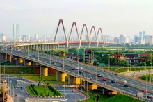 Con đường đi lên chủ nghĩa xã hội ở nước ta ngày càng được hoàn thiện và từng bước được hiện thực hóa. (Ảnh minh họa cầu Nhật Tân ở Thủ đô Hà Nội - Nguồn: tuyengiao.vn)