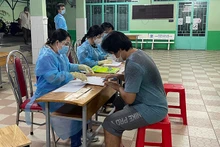 Chi trả hỗ trợ cho lao động tự do tại quận 5, TP Hồ Chí Minh. (Ảnh minh họa: Quý Hiền)