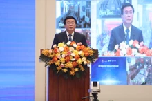 Ủy viên Bộ Chính trị, Giám đốc Học viện Chính trị quốc gia Hồ Chí Minh Nguyễn Xuân Thắng phát biểu tại đối thoại. (Ảnh: baochinhphu.vn)