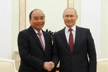 Chủ tịch nước Nguyễn Xuân Phúc và Tổng thống Vladimir Putin.
