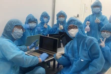 Sinh viên Khoa Y, Đại học Quốc gia TP Hồ Chí Minh nơi tuyến đầu chống dịch. (Ảnh: Thanh Thanh).
