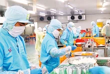 Người lao động tại Công ty Sài Gòn Food. (Ảnh minh họa: Quang Quý)