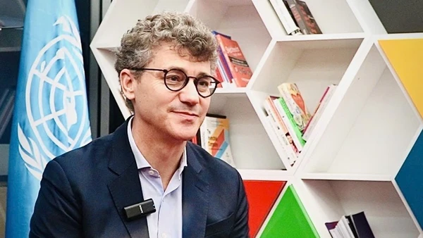 Ông Jonathan Wallace Baker, Trưởng Đại diện UNESCO tại Việt Nam trả lời phỏng vấn của phóng viên TTXVN. Ảnh: Việt Đức - TTXVN)