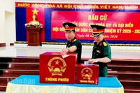 Lực lượng vũ trang ở đặc khu Thổ Châu đi bầu cử.