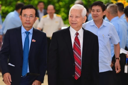 Nguyên Chủ tịch nước Nguyễn Minh Triết dự lễ kỷ niệm 50 năm thành lập Báo Tuổi Trẻ. (Ảnh: QUANG ĐỊNH)