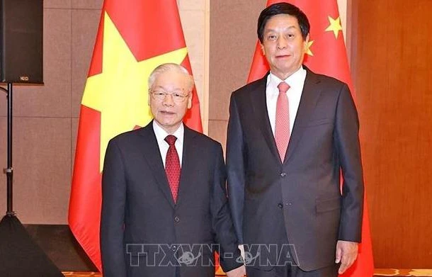 Tổng Bí thư Nguyễn Phú Trọng hội kiến Chủ tịch Quốc hội Trung Quốc Lật Chiến Thư. (Ảnh: TTXVN)