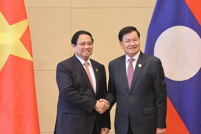 Thủ tướng Phạm Minh Chính hội kiến Tổng Bí thư, Chủ tịch nước Lào Thongloun Sisoulith. (Ảnh: VGP/Nhật Bắc)