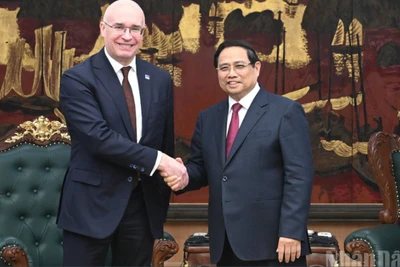 Thủ tướng Chính phủ Phạm Minh Chính và Tổng Giám đốc Hãng thông tấn TASS (Liên bang Nga) Andrey Kondrashov. (Ảnh: Trần Hải)