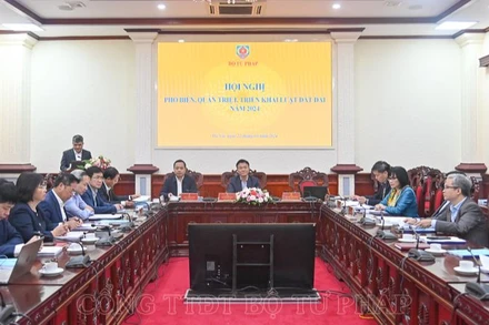 Các đại biểu dự Hội nghị tại điểm cầu Bộ Tư pháp. 