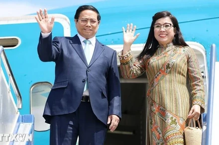 Thủ tướng Phạm Minh Chính và Phu nhân. (Ảnh: TTXVN)