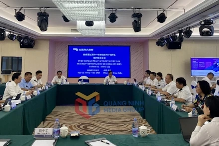 Quang cảnh buổi đàm phán giữa Tổng Công ty điện lực miền Bắc (Việt Nam) đàm phán với Công ty Lưới điện Quảng Tây (Trung Quốc).