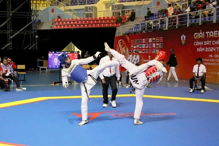 Trận đối kháng nội dung nam hạng cân dưới 58kg.