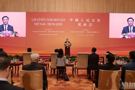 Chủ tịch Quốc hội Vương Đình Huệ phát biểu tại Gặp gỡ hữu nghị nhân dân Việt Nam-Trung Quốc.