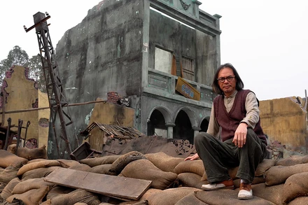 NSND, đạo diễn, diễn viên Trần Lực trên phim trường "Đào, phở và piano". Ảnh: Nhân vật cung cấp