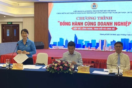 Lãnh đạo Liên đoàn Lao động Thành phố Hồ Chí Minh trao đổi tại Chương trình đồng hành cùng doanh nghiệp.