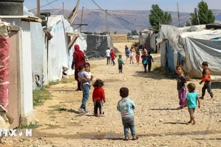Trẻ em Syria tại trại tị nạn ở Saadnayel, Liban, ngày 13/6/2023. (Ảnh: AFP/TTXVN)