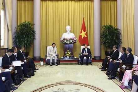 Chủ tịch nước Nguyễn Xuân Phúc tiếp cựu Đại sứ đặc biệt Việt Nam-Nhật Bản Sugi Ryotaro. (Ảnh: TTXVN)