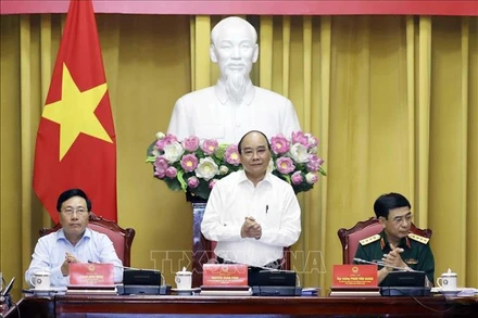 Chủ tịch nước chủ trì họp xây dựng Đề án Tổng kết 10 năm thực hiện Chiến lược bảo vệ Tổ quốc trong tình hình mới. (Ảnh: TTXVN)