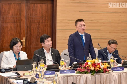 Ông Lê Quốc Minh, Tổng Biên tập Báo Nhân Dân phát biểu tại hội nghị (Ảnh: THÀNH ĐẠT)