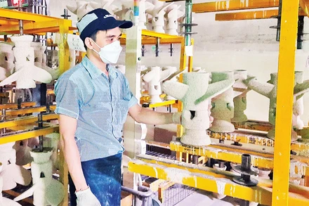 Lao động tại Công ty TNHH Juki Việt Nam, khu chế xuất Tân Thuận, quận 7, Thành phố Hồ Chí Minh. (Ảnh: Khánh Trình)