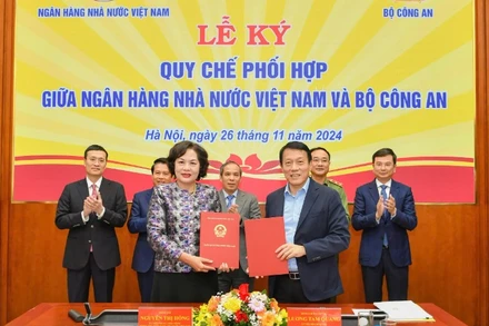 Lễ ký quy chế phối hợp giữa Ngân hàng Nhà nước Việt Nam và Bộ Công an.
