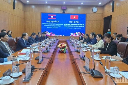 Quang cảnh cuộc hội đàm giữa lãnh đạo Ban Dân vận Trung ương với đoàn công tác Lào.