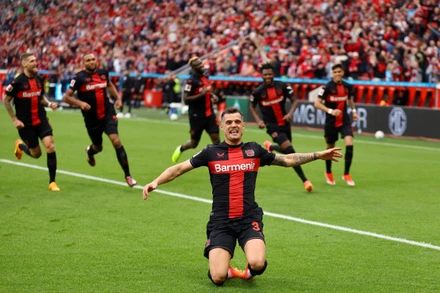 Bayer Leverkusen giữ vững kỷ lục bất bại. (Ảnh: Reuters)