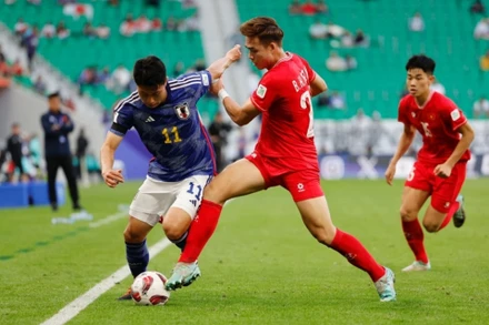Đội tuyển Việt Nam thi đấu kiên cường trước đội tuyển Nhật Bản. (Ảnh: Reuters)