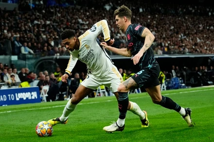 Thế trận đôi công hấp dẫn được Real Madrid và Manchester City tạo ra. (Ảnh: The Week)