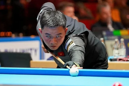 Bao Phương Vinh thi đấu tại Giải billard carom 3 băng đồng đội thế giới 2025. (Ảnh: Ton Smilde)