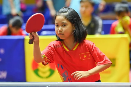 [Ảnh] Vững tay vợt từ tuổi lên 10