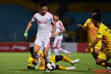 Hoàng Đức thi đấu năng nổ. (Ảnh: TRẦN HẢI)